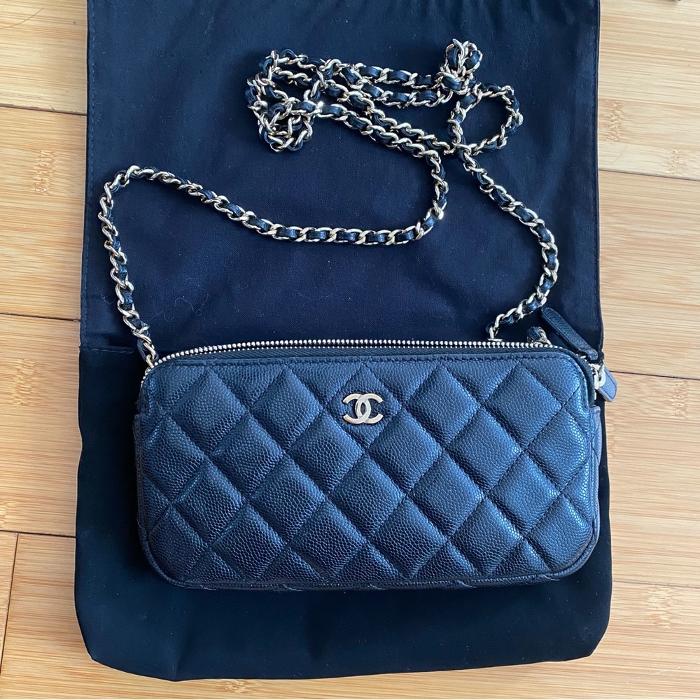 Chanel Clutch on Chain in black caviar leather
